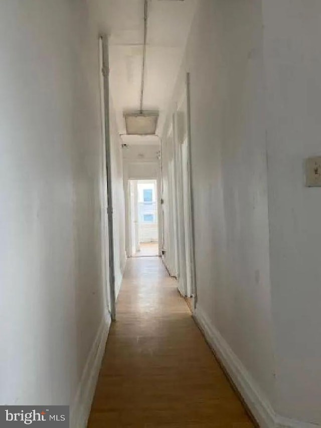 1720 1st St NW, Washington, DC 20001 - hall with light wood-style flooring and baseboards