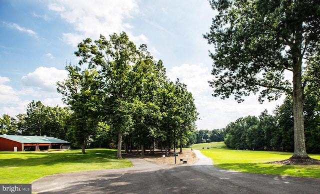 121 Jefferson Ave, Locust Grove, VA 22508 - view of asphalt road featuring view of scattered trees and an outbuilding