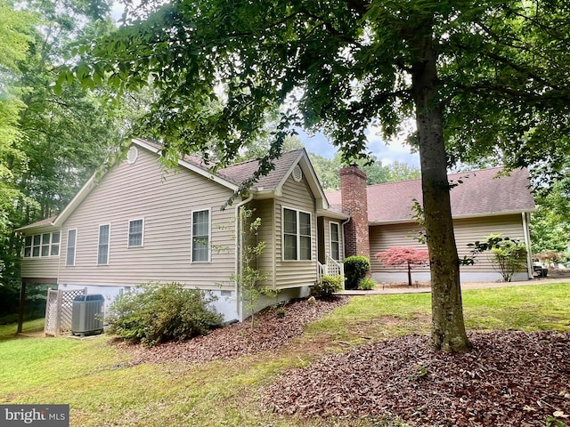 121 Jefferson Ave, Locust Grove, VA 22508 - view of side of home with a yard, a chimney, and a shingled roof