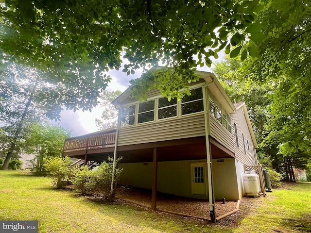 121 Jefferson Ave, Locust Grove, VA 22508 - rear view of house with a deck and a yard