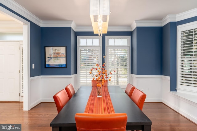 6139 Sligo Mill Rd NE, Washington, DC 20011 - dining room featuring wood finished floors and ornamental molding