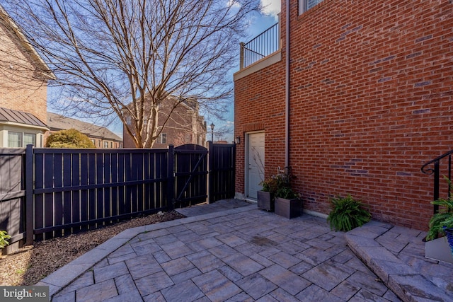 6139 Sligo Mill Rd NE, Washington, DC 20011 - view of patio featuring a gate and a balcony