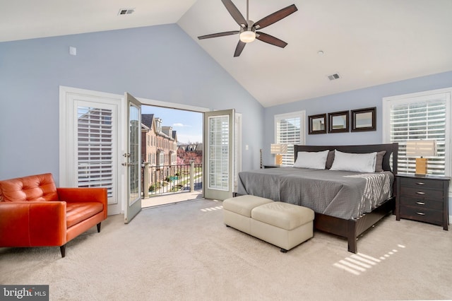 6139 Sligo Mill Rd NE, Washington, DC 20011 - carpeted bedroom with high vaulted ceiling, access to outside, and ceiling fan