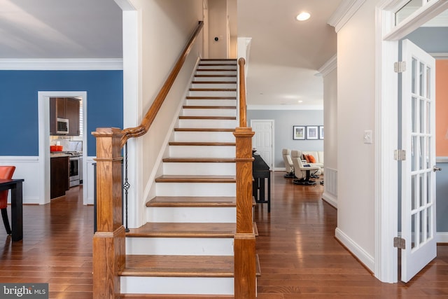 6139 Sligo Mill Rd NE, Washington, DC 20011 - stairs featuring wood finished floors, crown molding, and recessed lighting