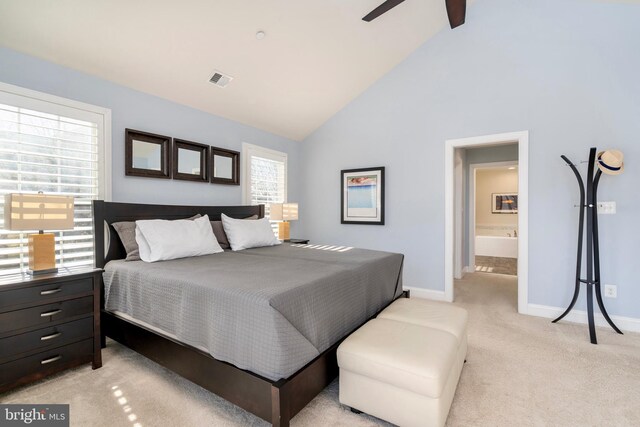 6139 Sligo Mill Rd NE, Washington, DC 20011 - bedroom featuring baseboards, light carpet, high vaulted ceiling, ensuite bathroom, and ceiling fan