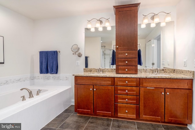 6139 Sligo Mill Rd NE, Washington, DC 20011 - bathroom featuring double vanity, a bath, tile patterned floors, and a shower stall