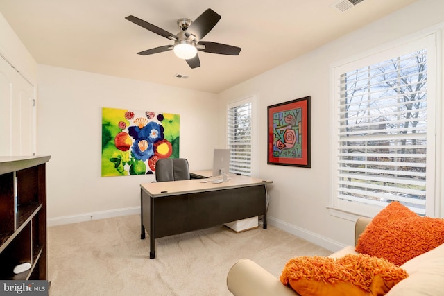 6139 Sligo Mill Rd NE, Washington, DC 20011 - home office featuring a ceiling fan, baseboards, and light carpet