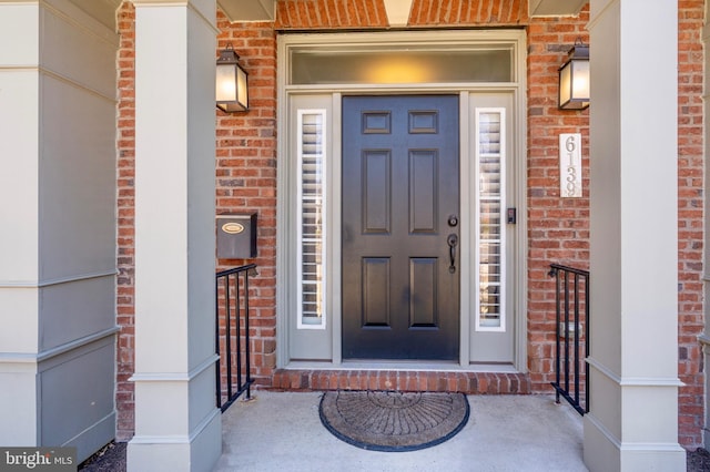 6139 Sligo Mill Rd NE, Washington, DC 20011 - doorway to property featuring brick siding and a porch