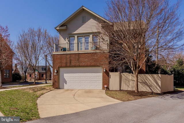 6139 Sligo Mill Rd NE, Washington, DC 20011 - view of front of property with a balcony, brick siding, concrete driveway, and a garage