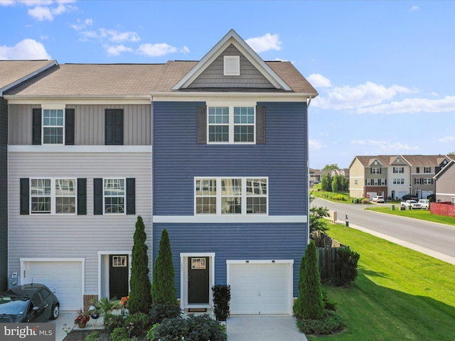 251 Magellan Dr, Martinsburg, WV 25404 - view of property with an attached garage, board and batten siding, a residential view, a front lawn, and driveway