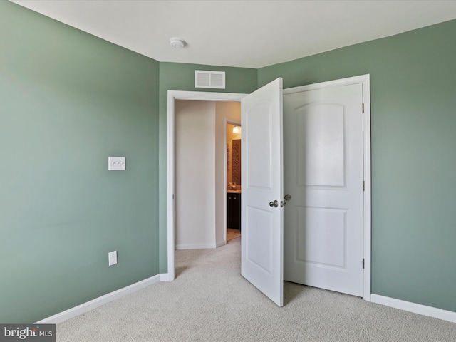 251 Magellan Dr, Martinsburg, WV 25404 - unfurnished bedroom featuring light carpet and baseboards