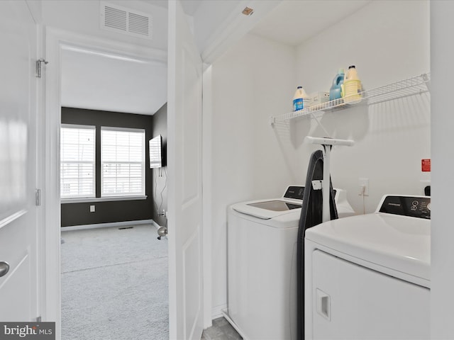 251 Magellan Dr, Martinsburg, WV 25404 - laundry area with washing machine and clothes dryer and carpet