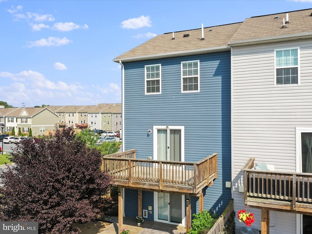 251 Magellan Dr, Martinsburg, WV 25404 - back of property with a deck, a residential view, and a shingled roof