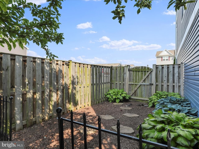 251 Magellan Dr, Martinsburg, WV 25404 - fenced backyard featuring a gate