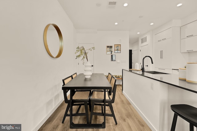 1500 Harry Thomas Way NE Unit 504, Washington, DC 20002 - dining area featuring light wood-style flooring and recessed lighting