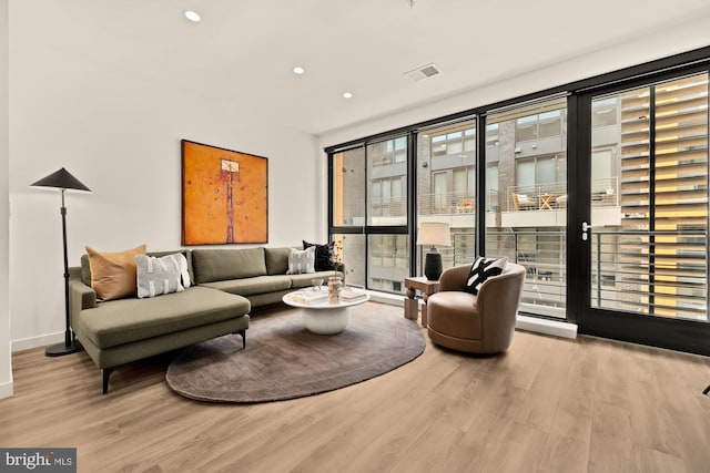 1500 Harry Thomas Way NE Unit 504, Washington, DC 20002 - living room with wood finished floors and recessed lighting