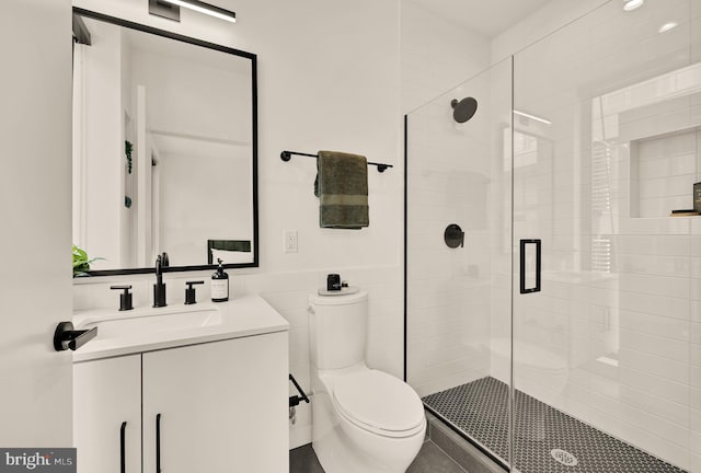1500 Harry Thomas Way NE Unit 504, Washington, DC 20002 - bathroom featuring vanity, a shower stall, and wainscoting