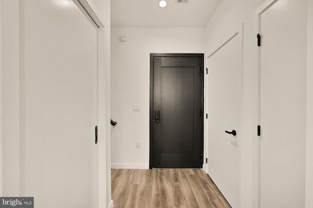 1500 Harry Thomas Way NE Unit 504, Washington, DC 20002 - corridor with light wood-style floors and baseboards
