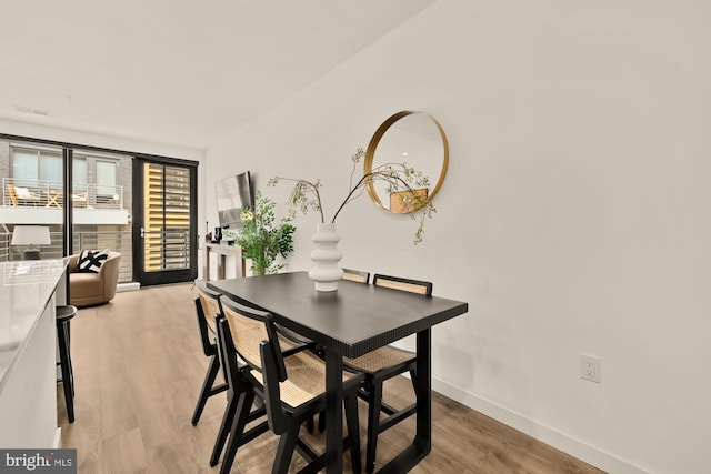 1500 Harry Thomas Way NE Unit 504, Washington, DC 20002 - dining area with light wood finished floors and baseboards