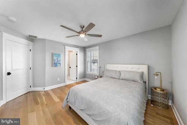 1005 Dune Dr, Avalon, NJ 08202 - bedroom featuring wood finished floors and a ceiling fan