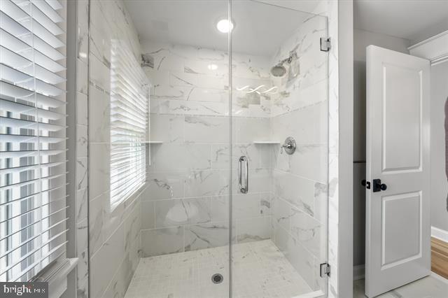 1005 Dune Dr, Avalon, NJ 08202 - full bathroom featuring a marble finish shower