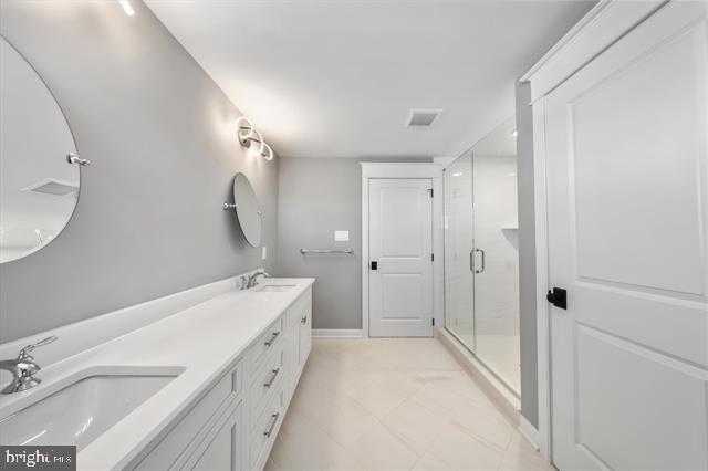 1005 Dune Dr, Avalon, NJ 08202 - full bath with a stall shower and double vanity