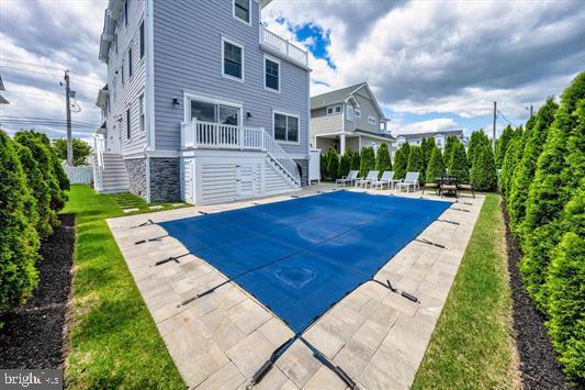 1005 Dune Dr, Avalon, NJ 08202 - view of pool featuring stairway and a patio