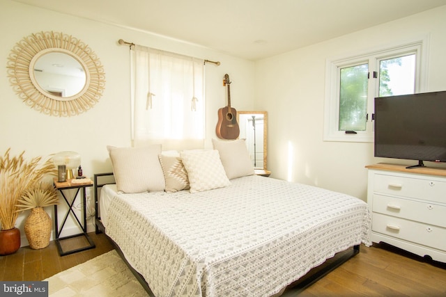 9007 Millers Island Blvd, Baltimore, MD 21219 - bedroom featuring dark wood-style flooring
