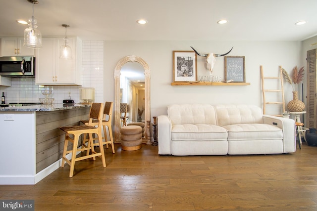9007 Millers Island Blvd, Baltimore, MD 21219 - living area featuring wood-type flooring and recessed lighting