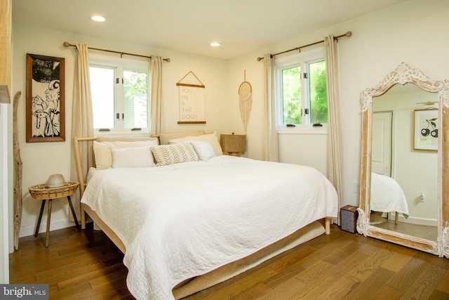 9007 Millers Island Blvd, Baltimore, MD 21219 - bedroom featuring dark wood-type flooring and recessed lighting