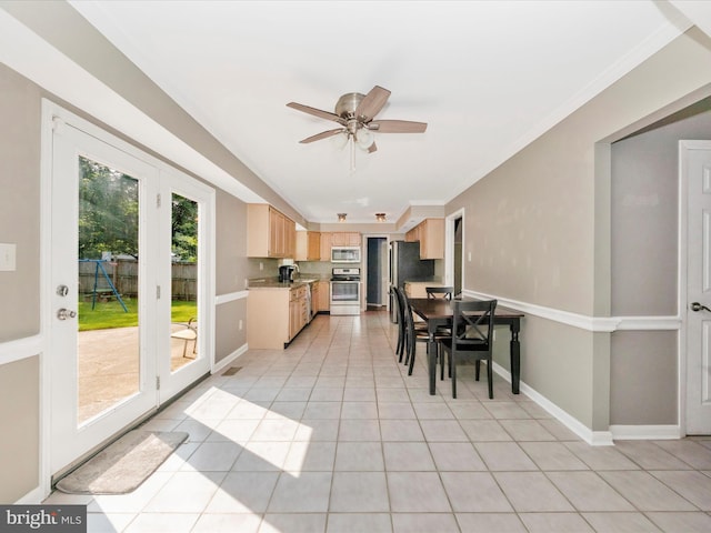 4503 Oakview Ln, Bowie, MD 20715 - kitchen with appliances with stainless steel finishes, light brown cabinets, light tile patterned floors, a ceiling fan, and light countertops