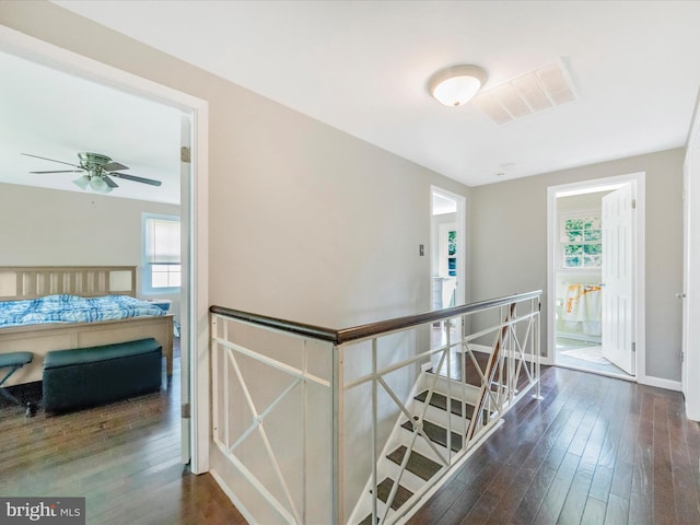 4503 Oakview Ln, Bowie, MD 20715 - hallway featuring an upstairs landing, healthy amount of natural light, and dark wood finished floors