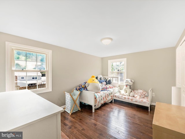 4503 Oakview Ln, Bowie, MD 20715 - bedroom featuring dark wood-type flooring and baseboards