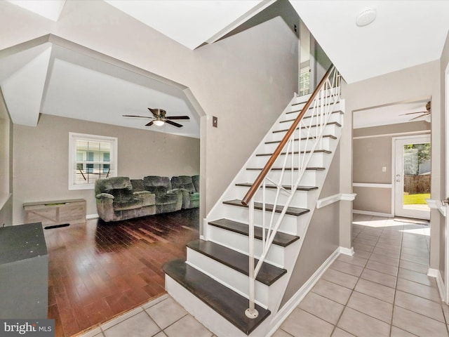 4503 Oakview Ln, Bowie, MD 20715 - stairs featuring a ceiling fan, tile patterned floors, and plenty of natural light