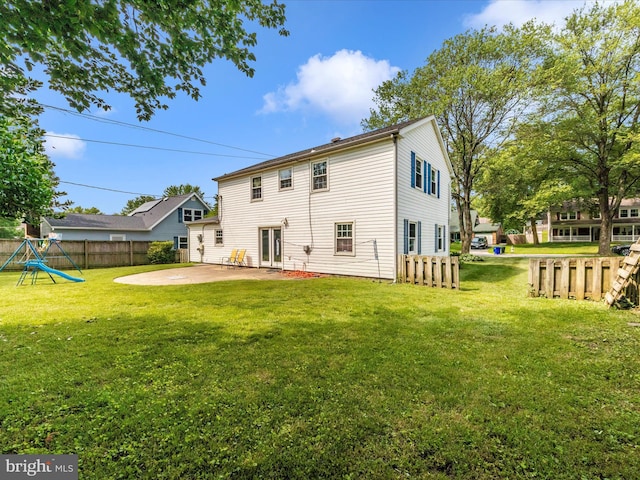 4503 Oakview Ln, Bowie, MD 20715 - rear view of house with a patio and a playground