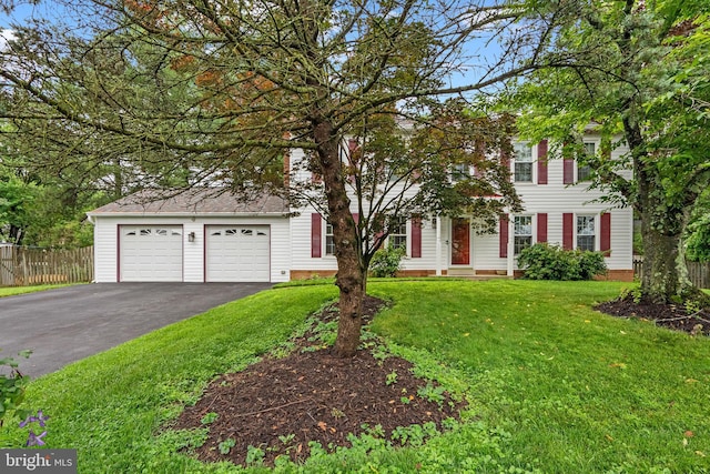 14519 Keeneland Cir, North Potomac, MD 20878 - colonial-style house with asphalt driveway and a garage