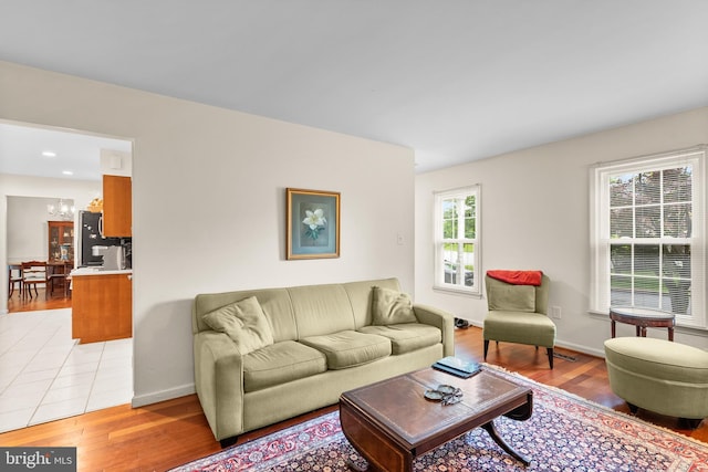 14519 Keeneland Cir, North Potomac, MD 20878 - living area with a chandelier and light wood-type flooring
