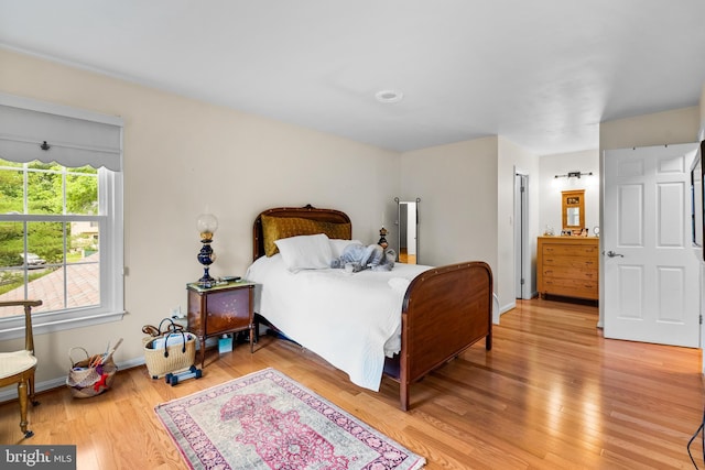 14519 Keeneland Cir, North Potomac, MD 20878 - bedroom featuring light wood finished floors and baseboards