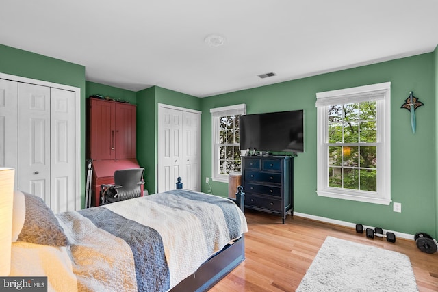 14519 Keeneland Cir, North Potomac, MD 20878 - bedroom with two closets and wood finished floors