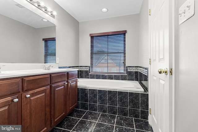 3515 Foundry Mews, Baltimore, MD 21211 - bathroom featuring a garden tub, double vanity, marble finish floors, and recessed lighting