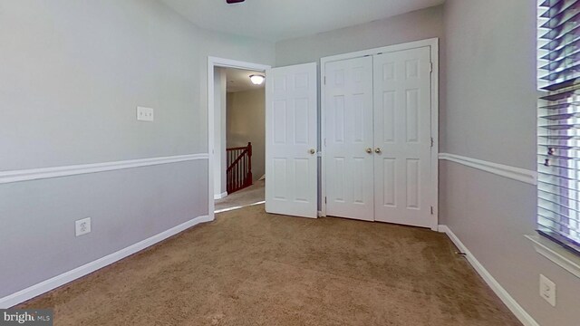 3515 Foundry Mews, Baltimore, MD 21211 - unfurnished bedroom featuring carpet flooring, a closet, and a ceiling fan