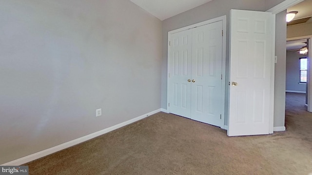 3515 Foundry Mews, Baltimore, MD 21211 - unfurnished bedroom with carpet, a closet, and lofted ceiling