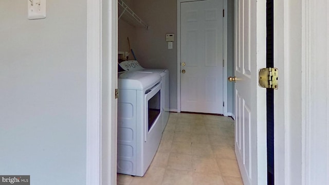 3515 Foundry Mews, Baltimore, MD 21211 - washroom with washing machine and dryer and light flooring