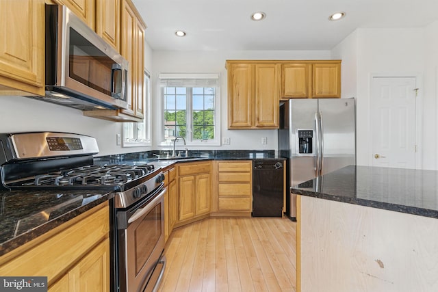 40461 Old Breton Beach Rd, Leonardtown, MD 20650 - kitchen featuring appliances with stainless steel finishes, light wood-type flooring, dark stone countertops, and recessed lighting
