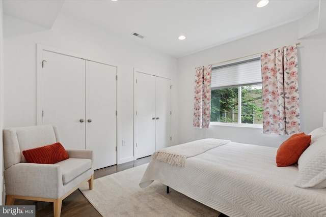 1002 S Colorado St, Philadelphia, PA 19146 - bedroom with two closets, wood finished floors, and recessed lighting