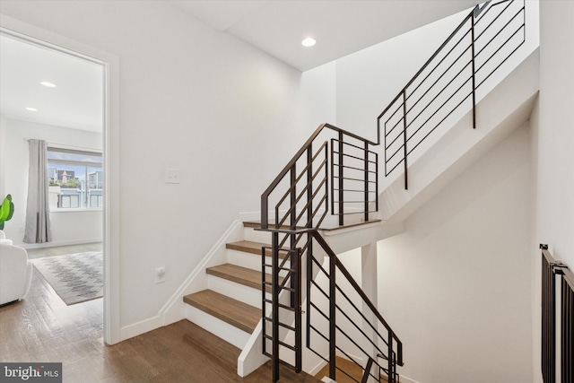 1002 S Colorado St, Philadelphia, PA 19146 - stairs with wood finished floors and recessed lighting