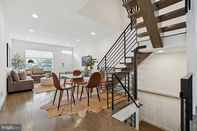 1002 S Colorado St, Philadelphia, PA 19146 - dining area featuring wood finished floors, stairs, and recessed lighting