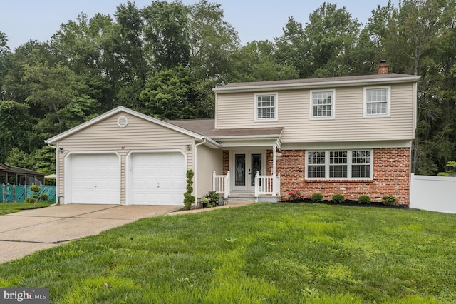 27 Kevin Way, Marlton, NJ 08053 - view of front of house featuring an attached garage, driveway, brick siding, a chimney, and french doors