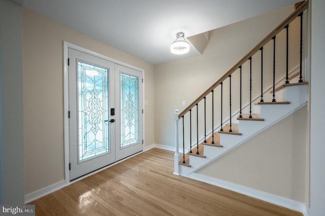 27 Kevin Way, Marlton, NJ 08053 - foyer with wood finished floors, french doors, and stairway