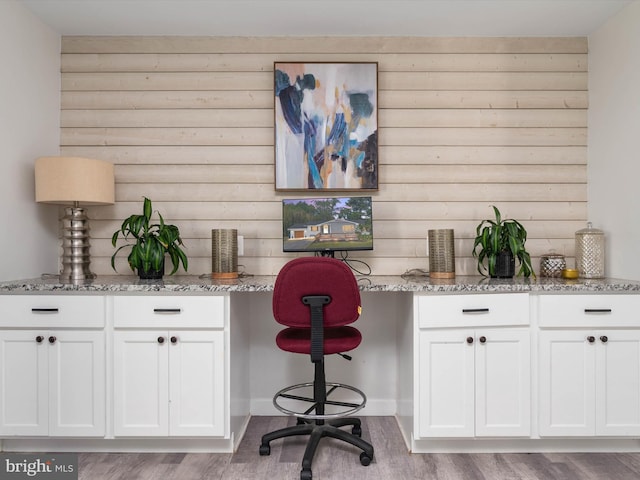 7802 Gary Ln, Severn, MD 21144 - office with built in desk, wood finished floors, and wooden walls
